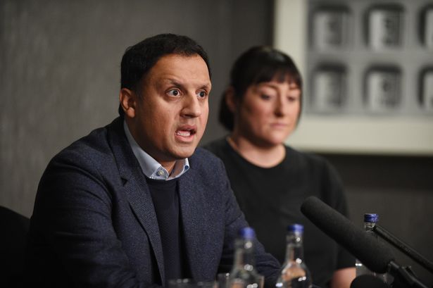 Anas Sarwar with Kimberly Darroch, mother of Milly Main, at a press conference